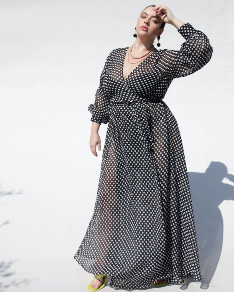 Front of a model wearing a size 5 The Polka Dot Wrap Dress - Black & White in Black & White by BAACAL. | dia_product_style_image_id:314176